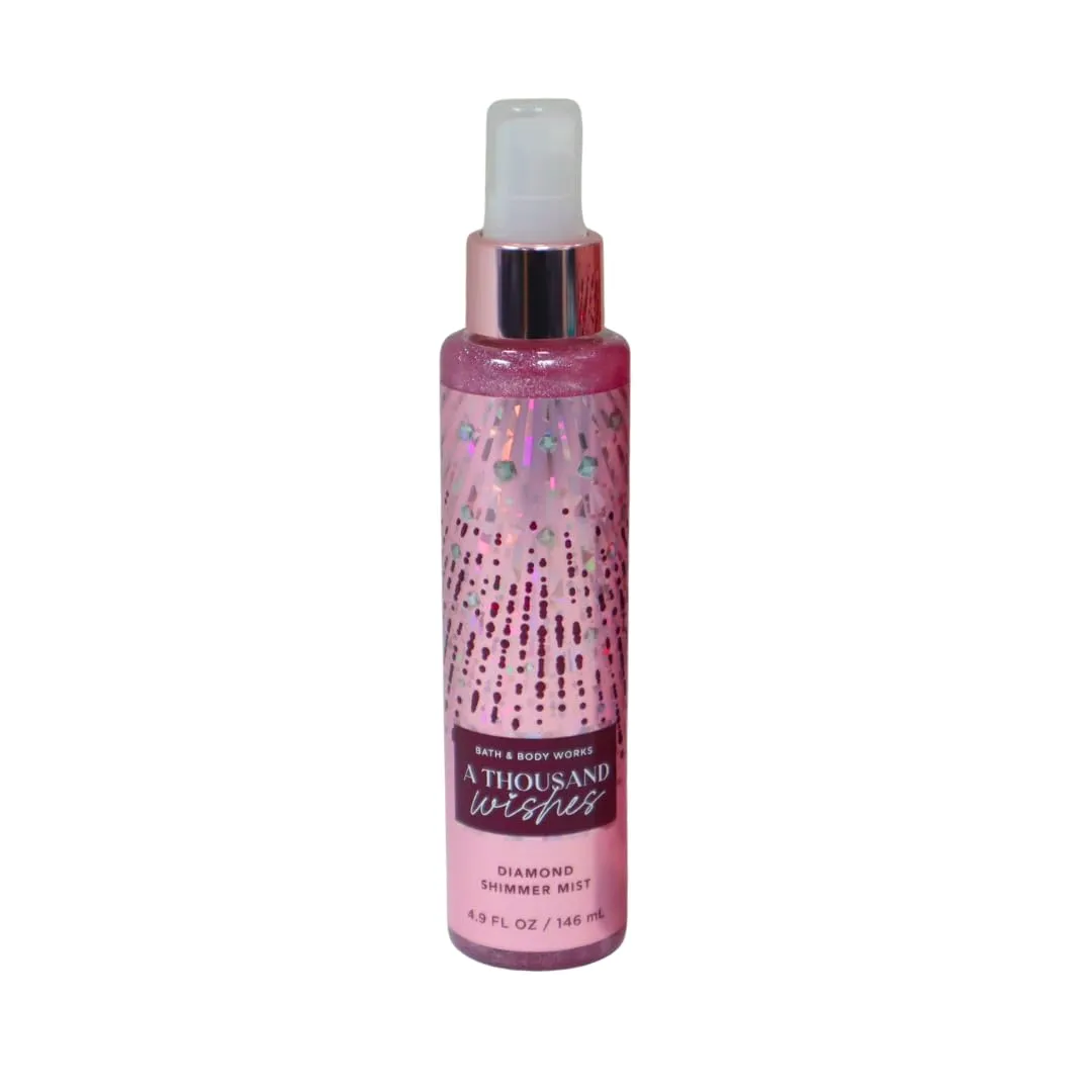 Bath & Body Works A Thousand Wishes Fine Fragrance Body Mist 8 oz & A Thousand Wishes Fine Fragrance Shimmer Body Mist 4.9 oz Gift Set packaging with a Red bow